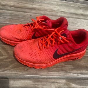 Neon orange nike shoes